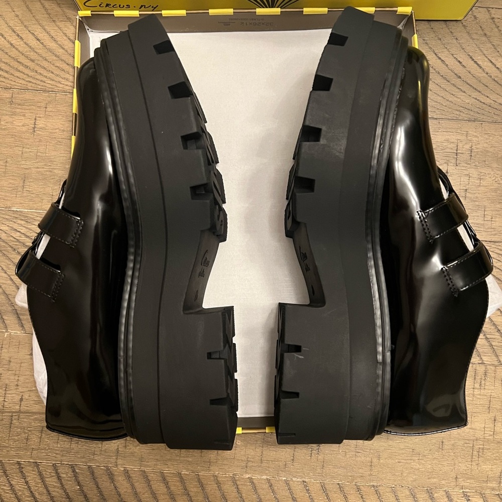 Brand new in box womens size 8.5 black lug boots with buckle detail